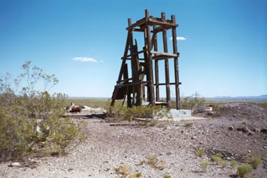 a solid cement foundation with steel bars covers the vertical shaft. However, there is a locked gate.