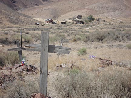 Tunnel graveyard with town in the background