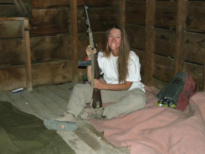 Cat sits on the other side of the cabin protecting Gary